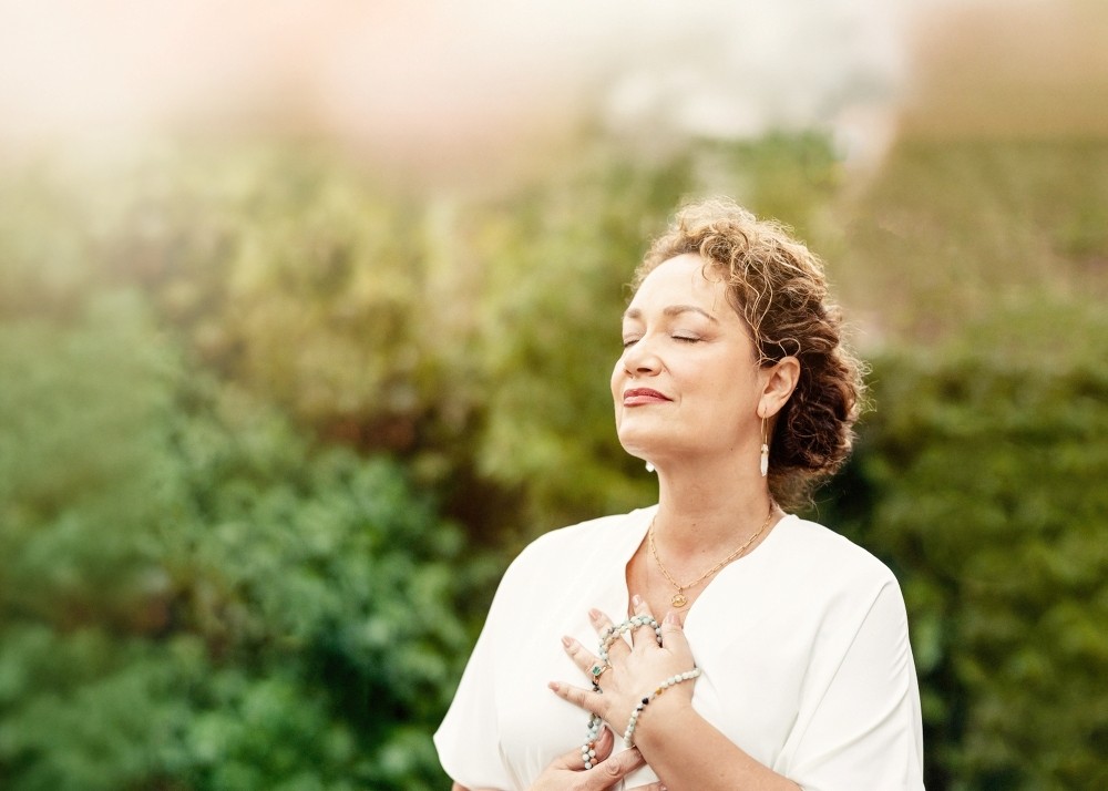Veruschka Baudo, Photographer, with hands on heart doing reiki
