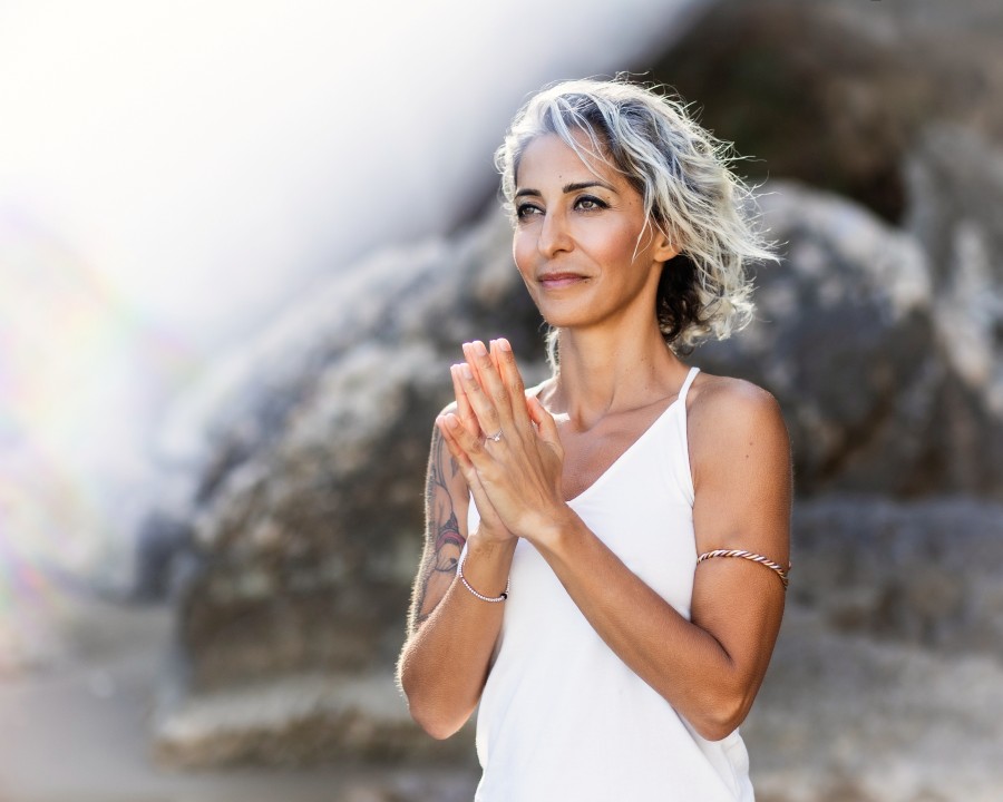 Woman smiling during reiki photoshoot