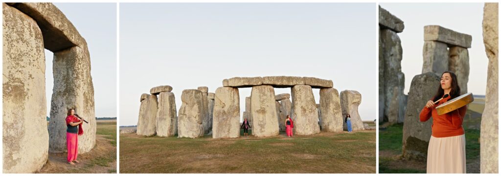 Women playing drums and flutes inside the sacred Stonehenge circle during a morning ceremony